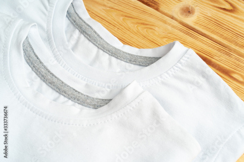 Close up of a white color t-shirt, copy space