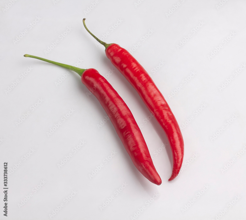 Red chili peppers isolated on white Red chili peppers isolated on white