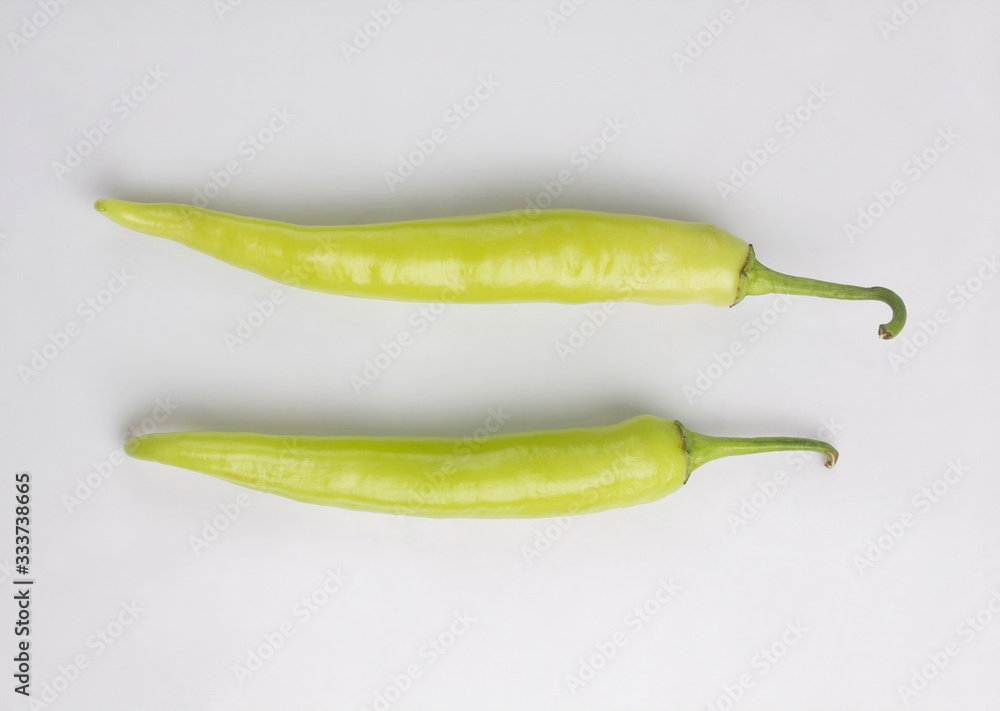 light green chili peppers isolated on white light green chili peppers isolated on white