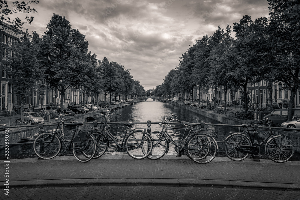 Amsterdam Canal and bikes in Black and White