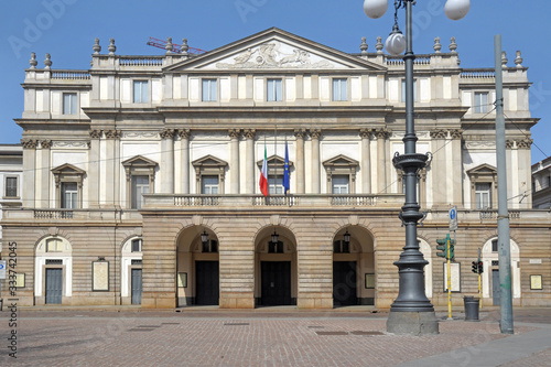 Europe, Italy, Milan March 2020 - completely deserted places of tourist interest, without people, for n-cov19 Coronavirus pandemic - Piazza della Scala - Scala theater 