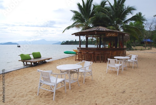 Beach bar And white chair.