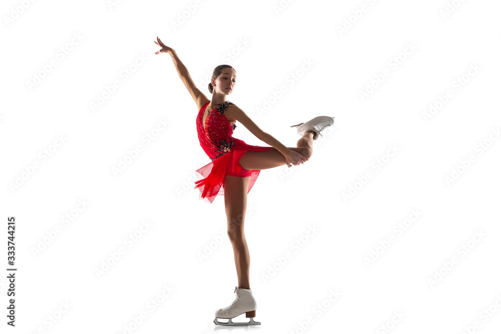 Girl figure skating isolated on white studio backgound with copyspace. Professional practicing and training in action and motion on ice. Graceful and weightless. Concept of movement, sport, beauty. Girl figure skating isolated on white studio backgound with copyspace. Professional practicing and training in action and motion on ice. Graceful and weightless. Concept of movement, sport, beauty.