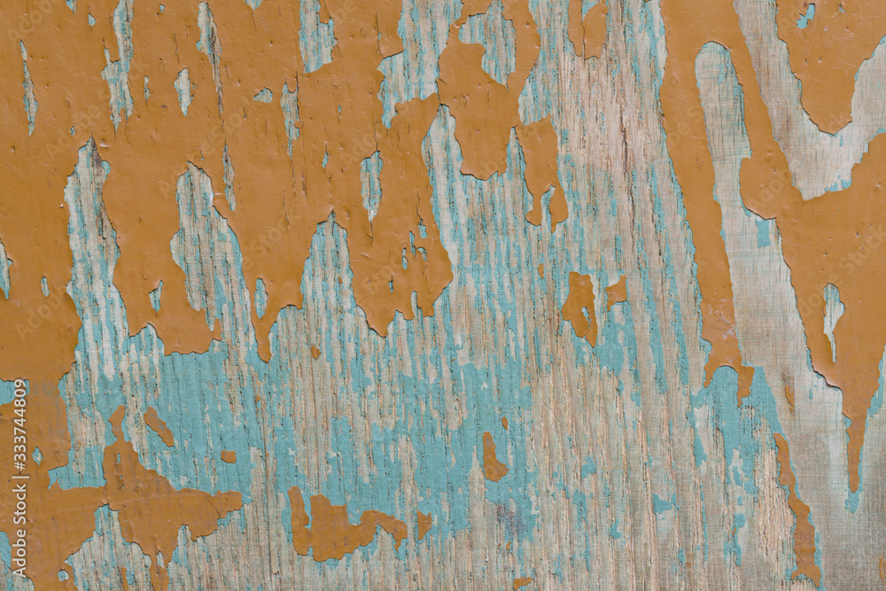 old painted Board with collapsed and cracked paint close-up old painted Board with collapsed and cracked paint close-up