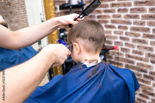  boy in a barbershop