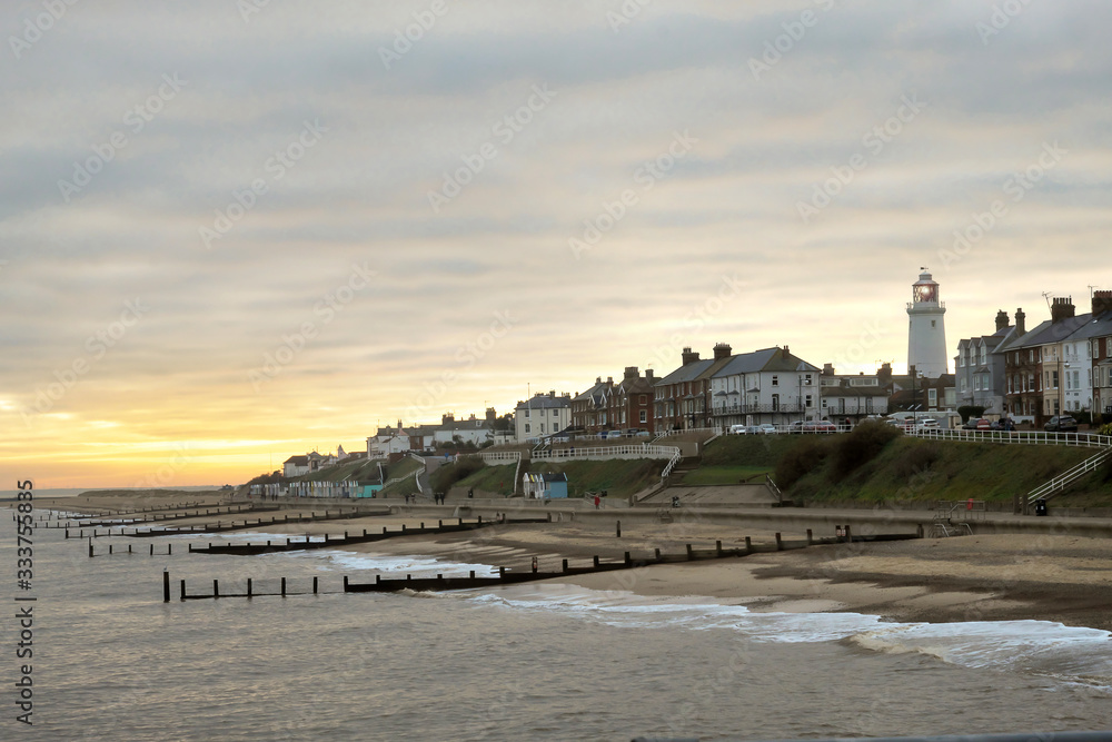Naklejka premium The village , the pier and the house light of Southwold, Suffolk, England.