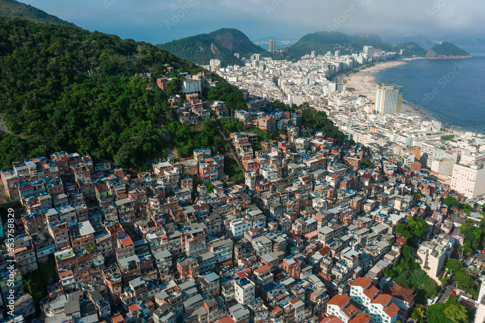 Aerial, panoramic view of Rio de Janeiro favelas and Copacabana in Brazil