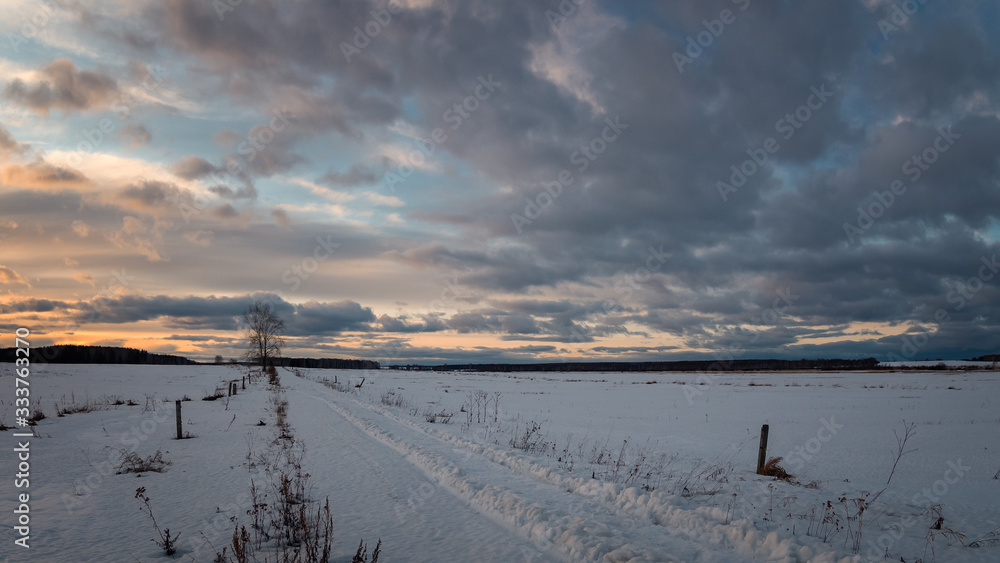 spring landscape in a field at sunset in the Urals, Russia, March spring landscape in a field at sunset in the Urals, Russia, March