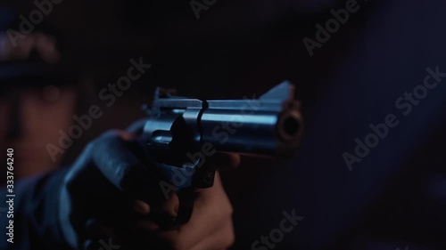 Stock video footage firearm firing of a gun in the dash