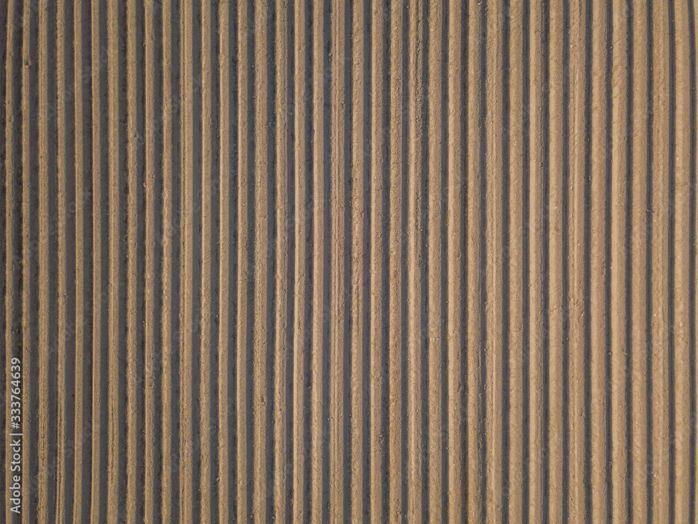 Aerial view of rows on potato farmland field. Concept of modern agriculture. Aerial view of rows on potato farmland field. Concept of modern agriculture.