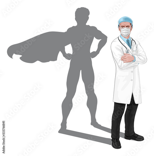 Super hero doctor concept. A medical healthcare professional with superhero shadow. With serious but caring look. Wearing protective face mask.