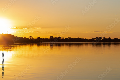 The lush sunset of autumn afternoons in the Brazilian savannah at Praia do Sol, on the banks of the Rio do Coco, a tributary of the Araguaia River. © Edilaine Barros