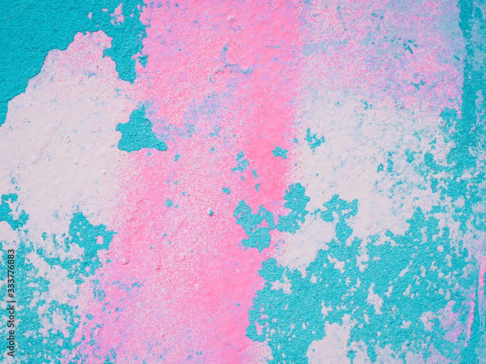 Turquoise and pink shabby concrete wall with flaky plaster. Vintage, cracked distressed background. Virid paint stains on white canvas. Abstract painting colorful background texture. Pastel color.