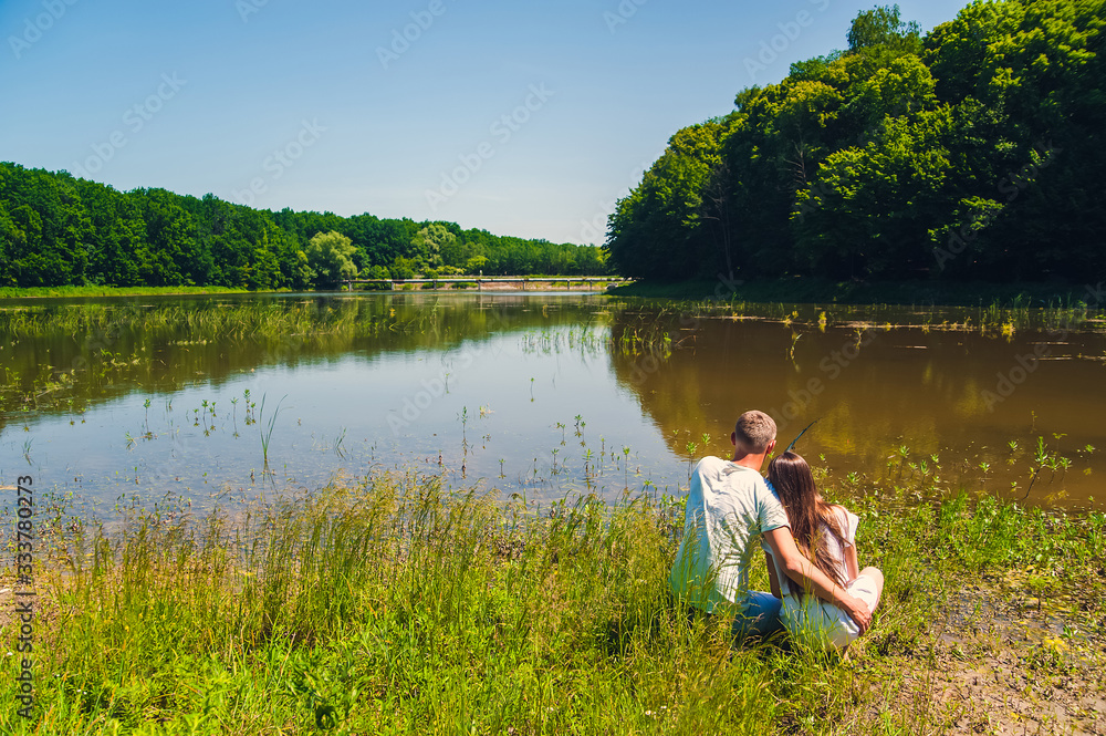 Loving couple fishing on a lake Loving couple fishing on a lake