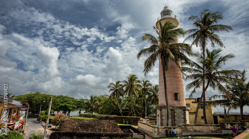  Lighthouse and palm trees