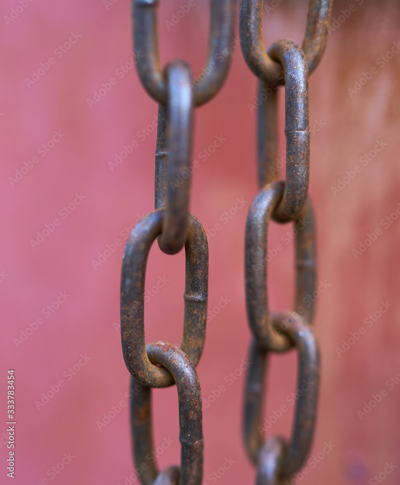 steel rusty chain on a beautiful background steel rusty chain on a beautiful background