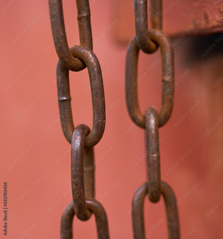 steel rusty chain on a beautiful background steel rusty chain on a beautiful background
