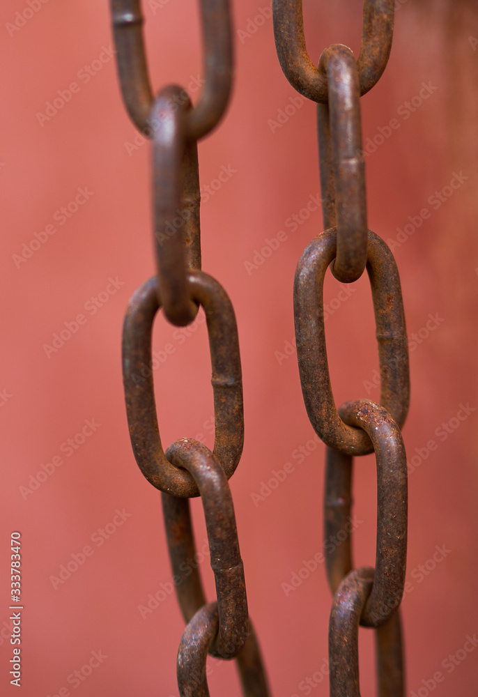 steel rusty chain on a beautiful background steel rusty chain on a beautiful background