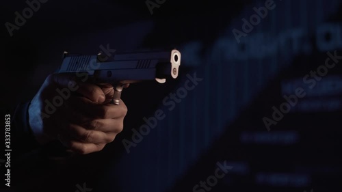 Stock video footage firearm firing of a gun in the dash