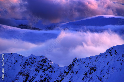 Sunset winter alpine landscape in National Park Retezat, Carpathians, Romania, Europe
