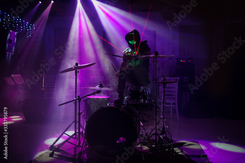A drummer show his laser light show