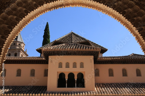 Palace of the Lions, a part of Nasrid Palaces (Palacios Nazaries) at the historical Alhambra Palace and fortress complex in Granada, Andalusia, Spain. photo