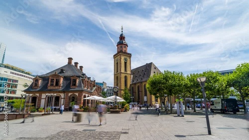 The Hauptwache (Main Guardroom) is a central point of Frankfurt am Main Germany, time lapse, hyperlapse video. Most popular square in Frankfurt city. St. Catherine's Church. photo