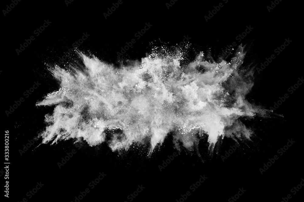 White powder explosion on black background. Colored cloud. Colorful dust explode. Paint Holi. White powder explosion on black background. Colored cloud. Colorful dust explode. Paint Holi.