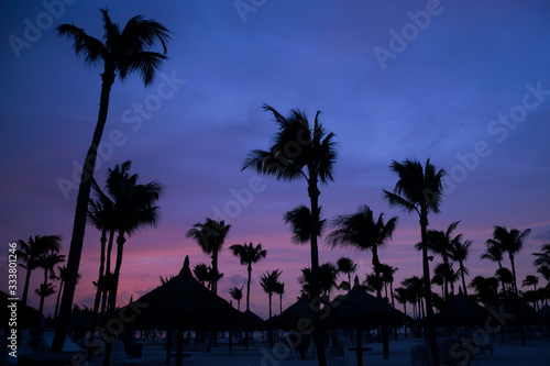 Beautiful Sunset on Palm Beach in Aruba © yobab