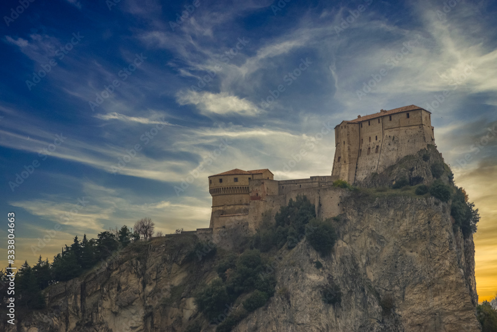 San Leo fortress during sunset with dreamy sky