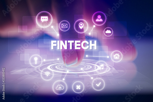 Wallpaper Mural Finger touching tablet with web technology icons and FINTECH inscription, web technology concept Torontodigital.ca