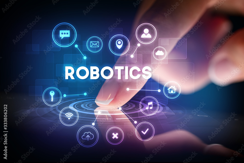 Finger touching tablet with web technology icons and ROBOTICS inscription, web technology concept Finger touching tablet with web technology icons and ROBOTICS inscription, web technology concept