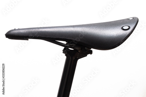 Black road bike saddle on white backgroung