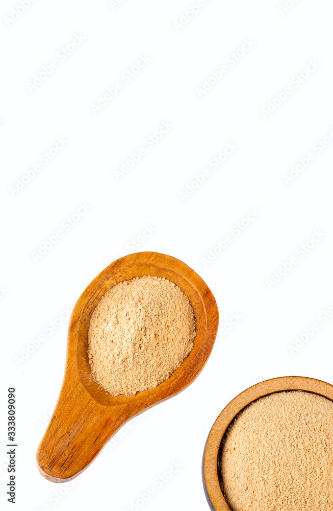 Lepidium meyenii Maca aphrodisiac powder in wooden spoon Stock