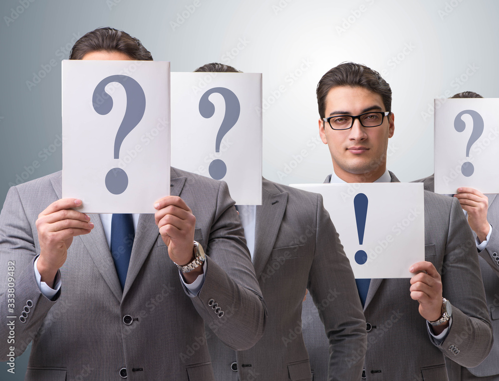 Businessman having answer to many questions Businessman having answer to many questions