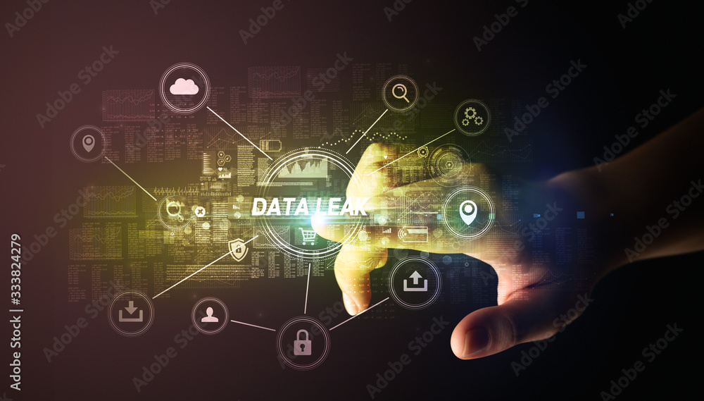 Hand touching DATA LEAK inscription, Cybersecurity concept Hand touching DATA LEAK inscription, Cybersecurity concept