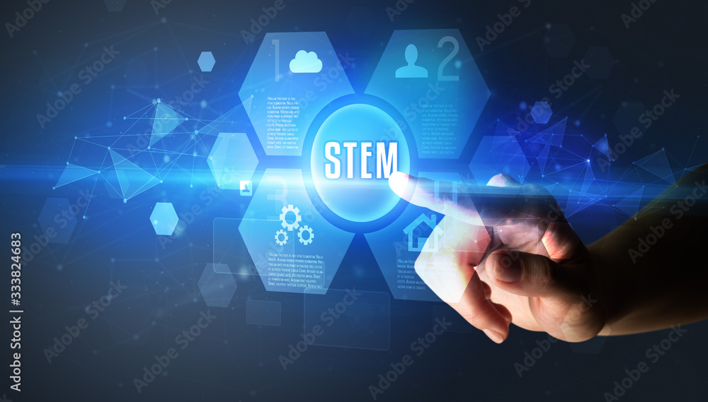 Hand touching STEM inscription, new technology concept Hand touching STEM inscription, new technology concept