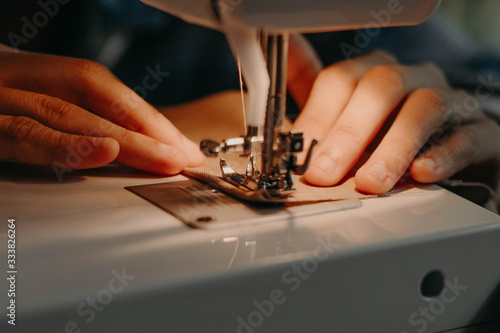 Fototapeta Naklejka Na Ścianę i Meble -  Cooking with sewing machine