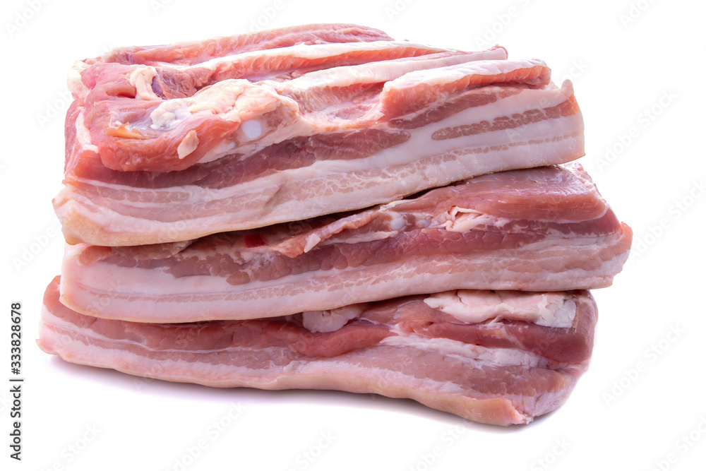 pieces of pork bacon on a white isolated background