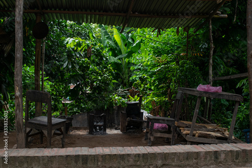 chairs in garden laos © Matthew