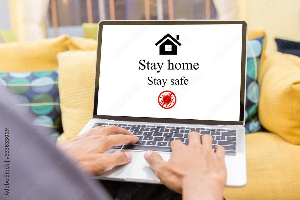 Businessman at home working with laptop,stay at home to reduce risk of infection and spreading the virus. Businessman at home working with laptop,stay at home to reduce risk of infection and spreading the virus.