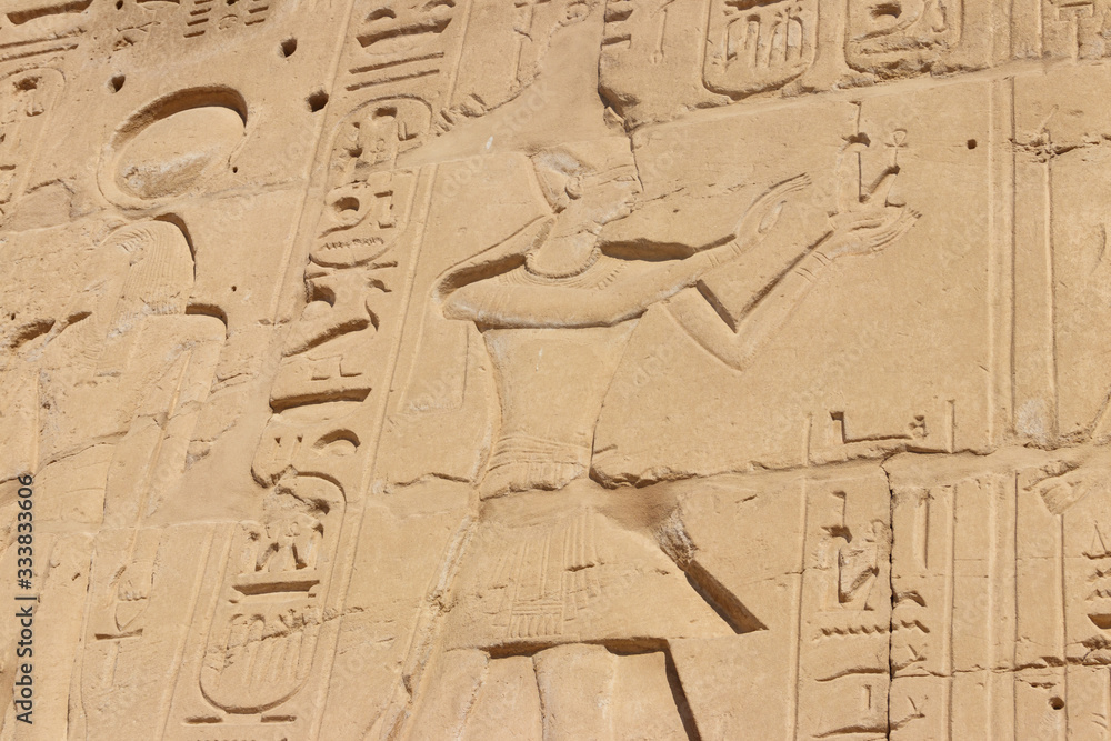 Ancient egyptian paintings and hieroglyphs on the wall in Karnak Temple Complex in Luxor, Egypt Ancient egyptian paintings and hieroglyphs on the wall in Karnak Temple Complex in Luxor, Egypt