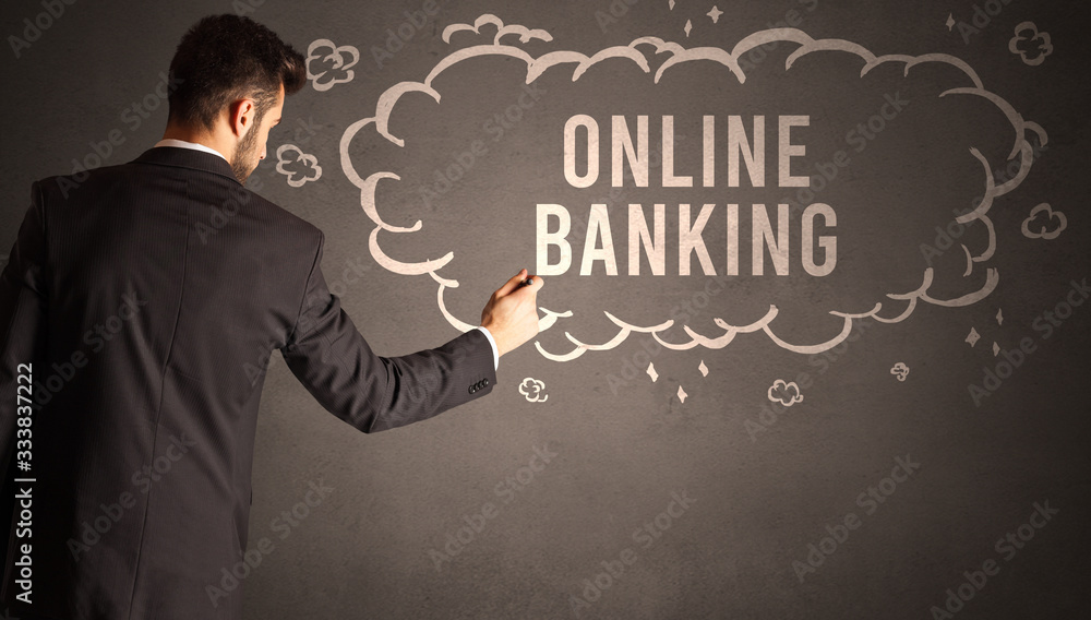 businessman drawing a cloud with ONLINE BANKING inscription inside, modern business concept businessman drawing a cloud with ONLINE BANKING inscription inside, modern business concept