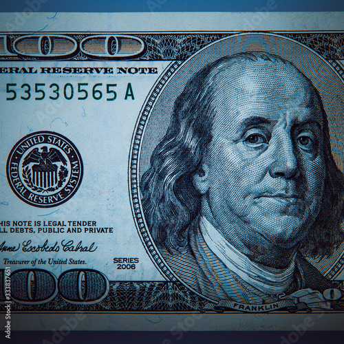 A portrait of President Franklin on a hundred dollar bill. Close up.