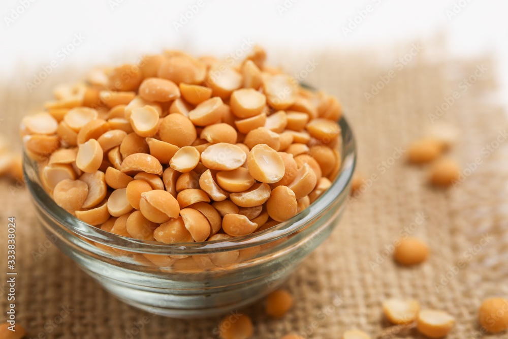 Dried chickpea lentils in Glass bowl on white background , Split Chickpea Also Know as Chana Dal Dried chickpea lentils in Glass bowl on white background , Split Chickpea Also Know as Chana Dal