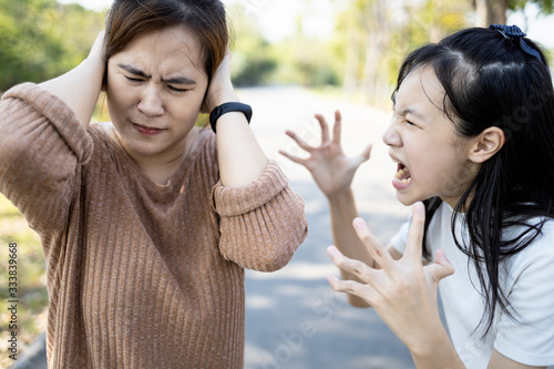 Canvastavla Angry child daughter shouting scolding at her mother about fussy things,nag,aggr