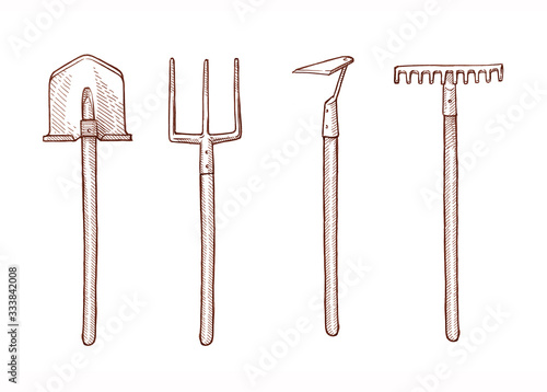 Engraving vintage tools/rake, hoe, shovel, pitchfork