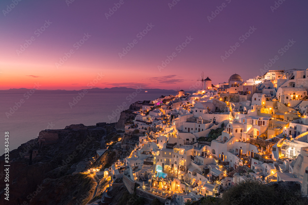 Impressive evening view of Santorini island. Picturesque spring sunset on the famous Greek resort Oia, Greece, Europe. Traveling concept background. Artistic style post processed photo.