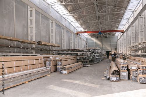 Industrial plant for production of metal profile for windows