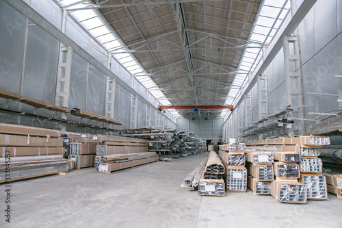 Industrial plant for production of metal profile for windows